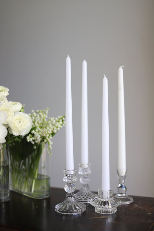 White taper candle + clear holder