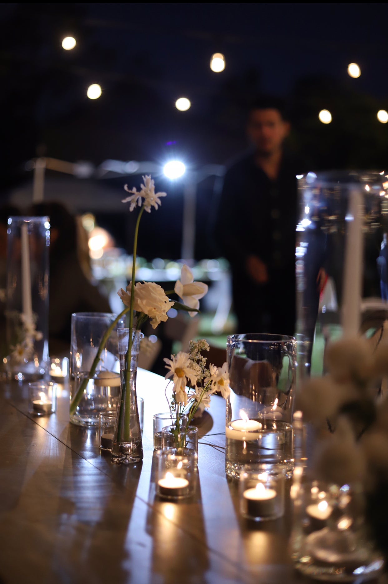 White taper candle + clear holder